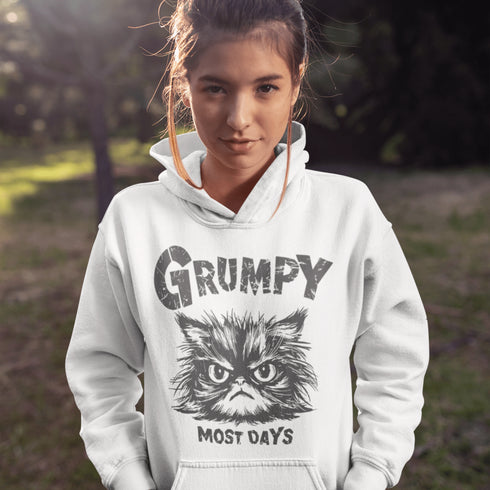 Introducing the "Grumpy Most Days" Hoodie—because let's face it, some days just require a permanent scowl. Featuring the grumpiest cat you’ve ever seen, this hoodie is perfect for those days when coffee, sunshine, or people just aren't cutting it.
